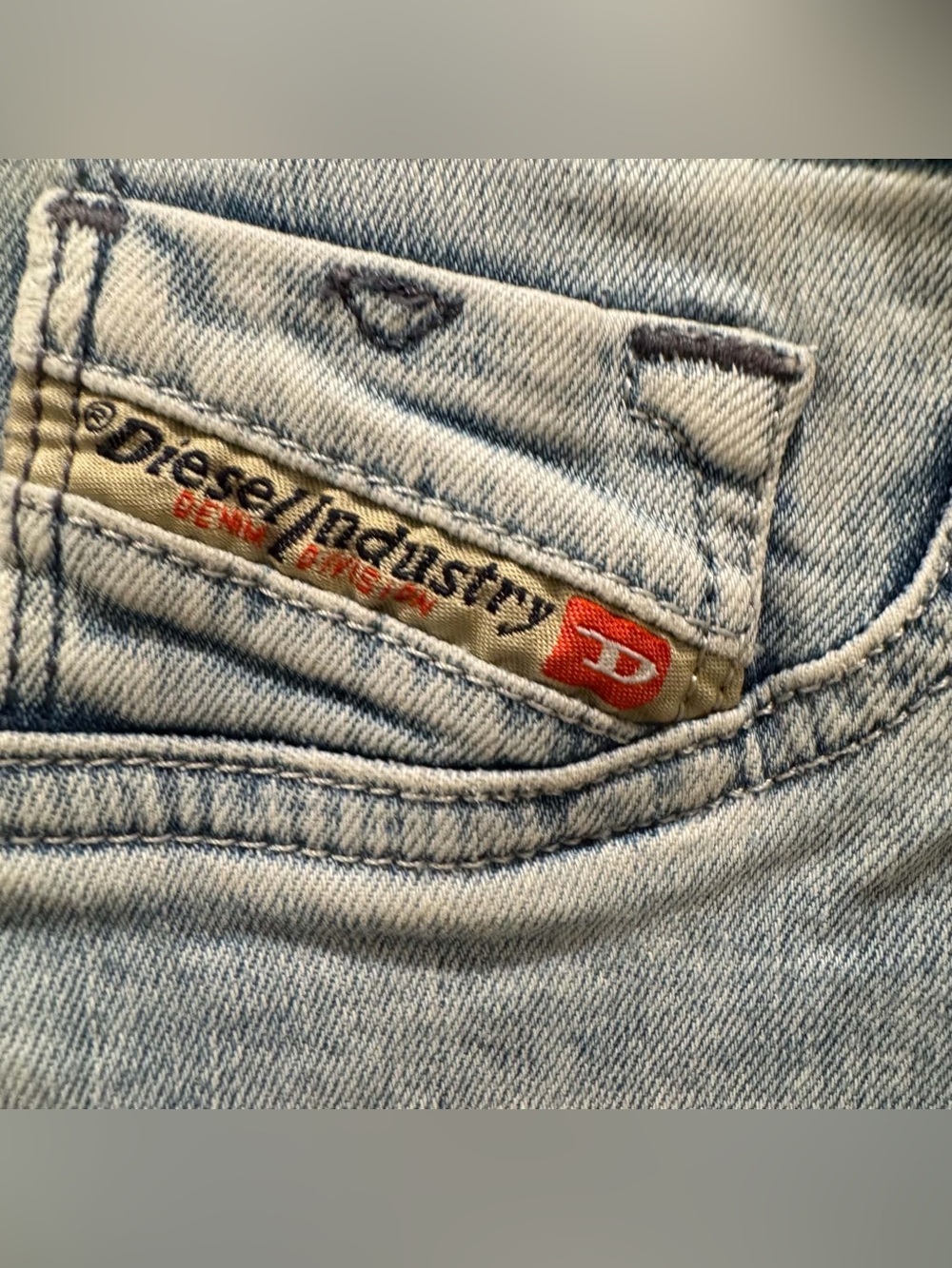 Vintage Diesel Light Wash Women's Y2K Jeans with Red Logo Tab Size 26